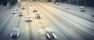 Cars Speeding Down Interstate At Rush Hour