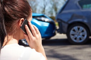 A woman after a car accident. Find out if it’s worth getting an attorney for a car accident today.