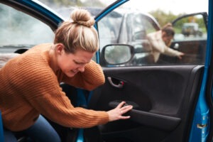 Two drivers get out of their cars after a Fort Wayne highway accident.