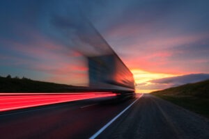 A large truck speeding down the road. You can seek compensation with a Portage truck accident lawyer.