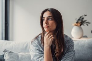 A young woman wondering if she should get a lawyer if a parent dies in a car accident. 