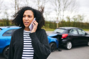 A woman wondering what to do if her Lyft driver was high and got into a wreck after a collision. 