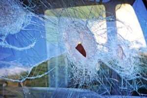 Broken glass in a truck windshield, representing what happened in the Tracy Morgan truck accident.